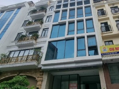 Cho thuê tòa nhà kính cạnh nhà hàng sen hồ 100m2 x 8 tầng, oto đỗ cửa 2