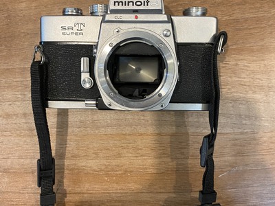 Cần bán máy ảnh MINOLTA SRT SUPER còn mới 99 0