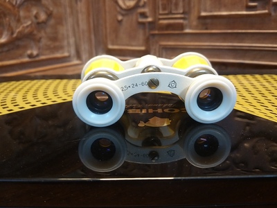 Bán ống nhòm xưa . 7