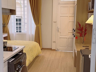 Bán tòa chdv kv thái hà, sát phố, ô tô vào nhà, 9 phòng, dt 600 tr/năm 2