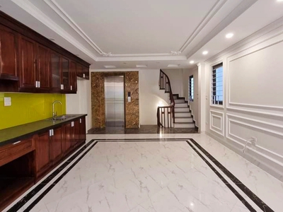 Nhà mặt phố Trần Vỹ 80m 7T giá 25 tỷ, lô góc vỉa hè, thang máy, KD, cho thuê 450tr/năm 1