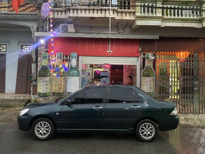 Chính chủ bán xe MITSUBISHI LANCER sản xuất năm 2004 số tự động 1