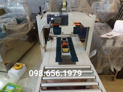 Máy dán băng keo 2 mặt thùng giấy, máy dán thùng carton bán tự động FXA 6050 0