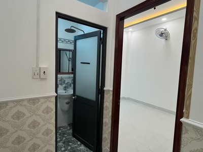 Bán nhà mới trệt lầu 3pn sổ hồng riêng 680tr cách cầu lớn hóc môn 2km 7