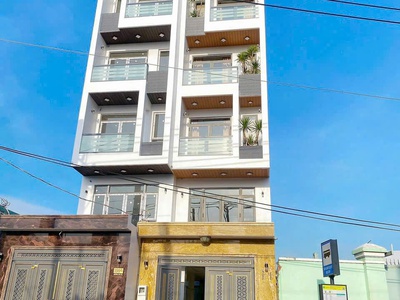 Nhà mặt tiền Mã Lò, Bình Trị Đông A dt 108m2 5,5 lầu ,5pn,6wc, sân thượng ,thang máy giá 13,99 tỷ 0