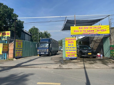 Bãi giữ xe rửa xe  24/24 và cho thuê đất trống 1