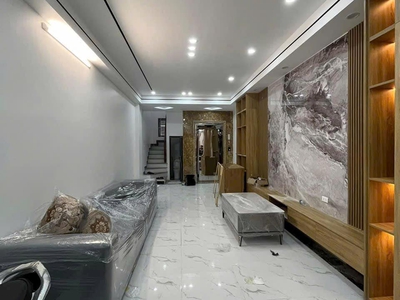 Bán  nhà phùng chí kiên phân lô, gara 7 chỗ thang máy 52m 6 tầng 15.2tỷ 1