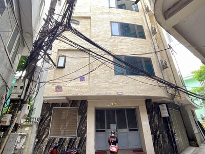 Tòa căn hộ dịch vụ, dt 157m2, 6 tầng 22 phòng khép kín   cừa hàng, lô góc oto tránh, 31 tỷ 0