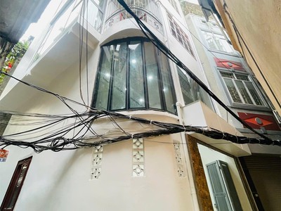 Bán nhà đường la thành, ba đình, hà nội. diện tích: 39m2, lô góc, 3 mặt thoáng, 5 tầng, sđcc. giá: 4