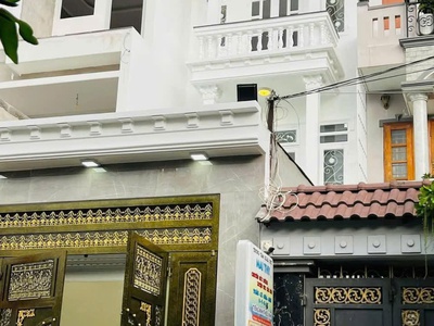 Nhà mới mặt tiền 4mx25m gần bến xe buýt hiệp thành, gần lê văn khương kế bên gò vấp 0