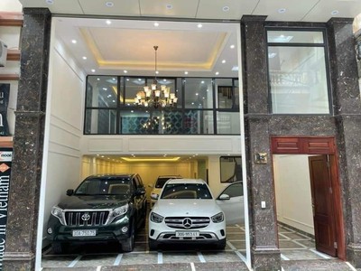 Bán tòa văn phòng hoàng quốc việt gara 2 ô tô, thang máy,  kd vp, spa 100m nhỉnh 33 tỷ 1