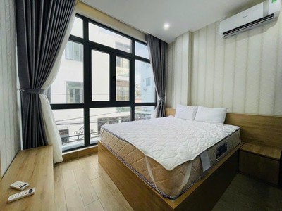 Giảm sâu 4 tỷ   toà căn hộ 4 diện tích 161m2 ngang 6.2m, 12 phòng doanh thu 100 tr/ tháng. 4