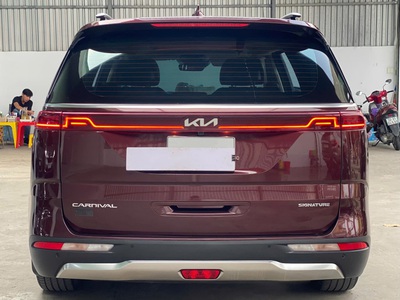 Bán xe Kia Carnival 2023 Signature 2.2D Full dầu, màu đỏ mận. 1