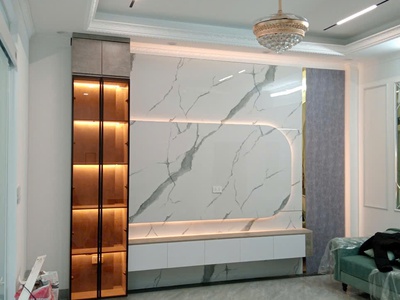 Vách tivi PVC vân đá kết hợp tủ trang trí phòng khách 2