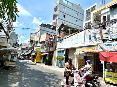 Nhà bán mặt tiền đ. xóm chiếu- vi trí kinh doanh sầm uất- đối diện trường trung học nguyễn trải 2