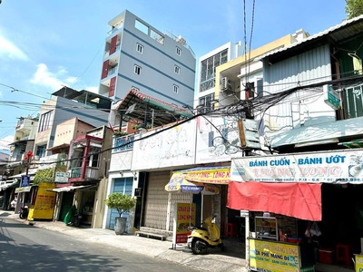 Nhà bán mặt tiền đ. xóm chiếu- vi trí kinh doanh sầm uất- đối diện trường trung học nguyễn trải 1