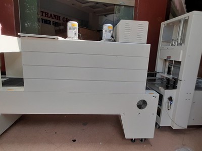Máy cắt dán và rút màng co PE cho lốc chai- lon, máy màng co PE bán tự động 2