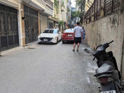 B.á.n n.h.à hoàng văn thái - toà nhà vp -view đầm hồng-phân lô - ô tô tránh 65m-23.8t.ỷ 1