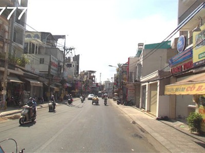 Bán tòa nhà ngang 7m, 6 tầng thang máy, mt lê quang định, q bình thạnh 2