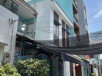 Nhà bán đ,trần xuân soạn- ngang lớn- xe hơi ngủ trong nhà- trước nhà đường 6m- khu dân trí cao. 0