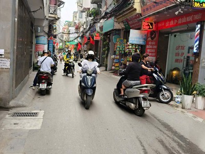 Bán nhà mặt phố hoàng văn thái , kinh doanh đỉnh , ô tô đỗ cửa , thang máy chờ , 87m2 . giá chỉ 2