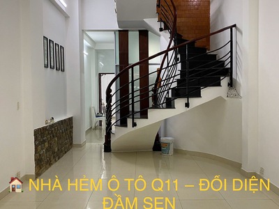 Nhà hẻm ô tô quận 11, đối diện đầm sen. diện tích 168m , thu nhập cho thuê 25 triệu/tháng. sổ hồng 1