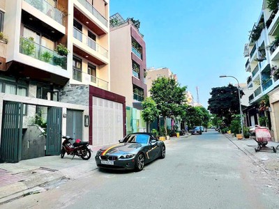 Nhà mt an phú quận 2, 5x20  1 hầm 4 lầu, giá siêu rẻ 1