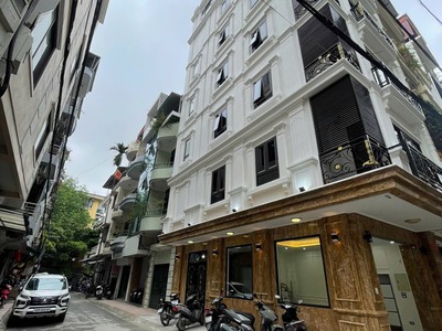 Tin thật 100  bán nhà lô góc cao cấp xây mới 60m2 x 8t tại mặt phố vĩnh phúc - phân lô ô tô tránh 0