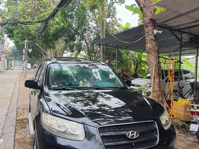 Chính chủ bán xe SANTAFE đăng ký 2009  máy  xăng 12 lít /100km, số tay 0