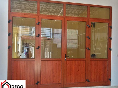 So sánh cửa nhôm kính 4 cánh vân gỗ và cửa gỗ tự nhiên 0