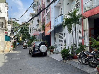 --bán nhà góc 2mt phạm văn hai, phường 3, tân bình  4x24  4 lầu đẹp 2