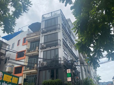 Mặt phố lô góc   nguyễn văn tuyết  dòng tiền 2.4 tỷ/năm   8 tầng thang máy 0