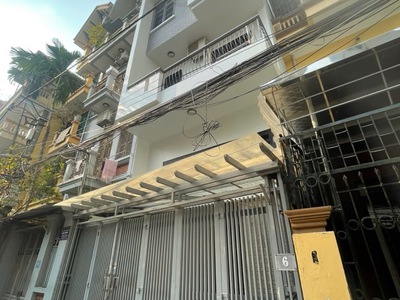 Nguyên Căn 5 Tầng - Có Gara Oto 7 Chỗ - Mặt Tiền Rộng - View Đẹp 0