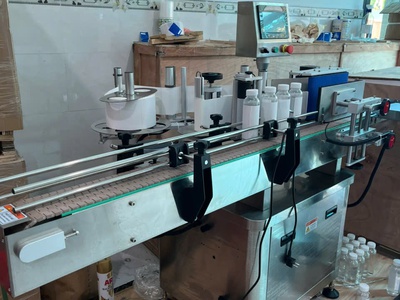 Máy dán nhãn chai tròn tự động, máy dán tem nhãn decal chai lọ, máy dán nhãn hủ yến 1