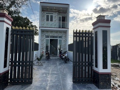Nhà đẹp mặt tiền đường nhựa xã Mỹ Lộc, Cần Giuộc, Long An tổng dt 120m2 1 lầu 4pn 2wc 1