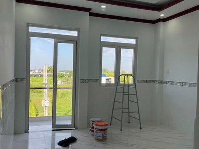 Nhà đẹp mặt tiền đường nhựa xã Mỹ Lộc, Cần Giuộc, Long An tổng dt 120m2 1 lầu 4pn 2wc 3