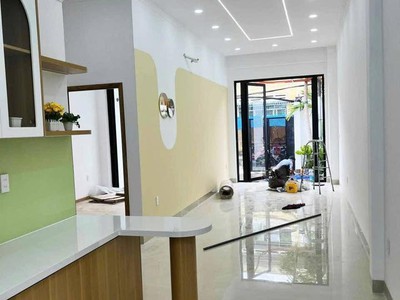 Nhà mới hoàn thiện 123m2 mặt tiền đường tân thới nhì, xe hơi ngủ trong sân. gần trường thcs lý 3
