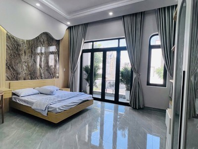 Nhà đẹp 1 trệt 1 lửng 2 lầu   sân thượng trước sau - chiêu liêu - dĩ an 2