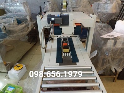 Máy dán băng keo thùng giấy, máy dán 2 mặt đáy thùng carton FXA6050 0