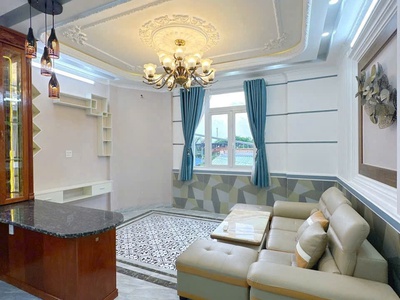 54. nhà 1 trệt 3 lầu, sân thượng, góc 2 mặt tiền, có chỗ đậu ôtô trong nhà 3