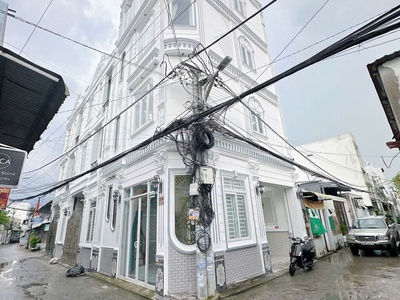 54. nhà 1 trệt 3 lầu, sân thượng, góc 2 mặt tiền, có chỗ đậu ôtô trong nhà 0