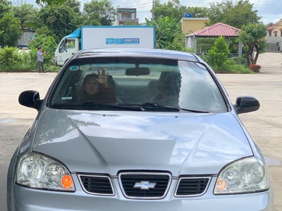 Em cần bán xe chervolet laceti đời 2004 0
