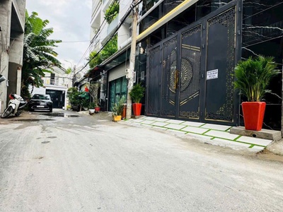 Bán nhà mới xe hơi ngủ nhà 4 tầng 4 phòng ngủ 0