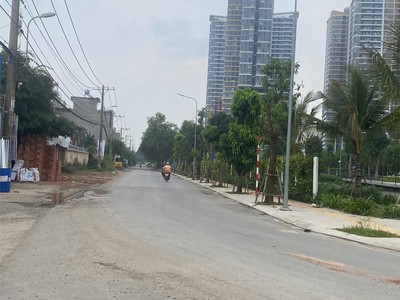 Bán đất phước thiện   long bình   quận 9, đường 7m có lề 3m, ngang hiếm 5.5m, sổ hồng riêng, dân 3