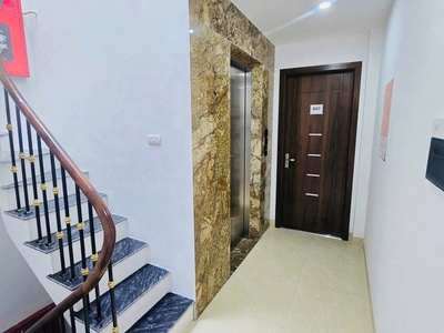 Bán tòa nhà chùa láng, đống đa - 70m x 7t thang máy - 18 phòng kk - dòng tiền 85tr/th - giá 26 tỷ 4