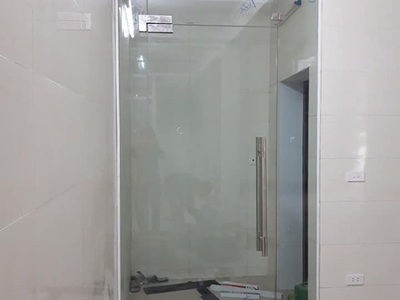 Thi công cửa kính bản lề sàn 1 cánh giá rẻ bảo hành dài hạn 0