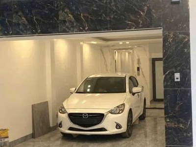 Phố trạm - 52m - oto vào nhà - lô góc, ngõ thông - 6 tầng - thang máy kinh doanh - 12.x tỷ 0