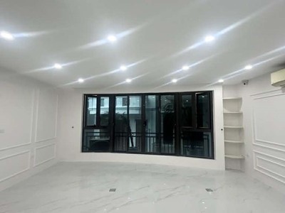 Bán nhà cách hồ Phương Mai 20m 65m2 7T thang máy MT rộng Ngõ thông ô tô Kinh doanh đỉnh 2x tỷ 2