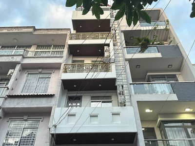 Nhà ngộp hẻm 10m quang trung 94m2 6 tầng có t.máy kd đỉnh ngay chợ htt nhỉnh 15 tỷ. 0