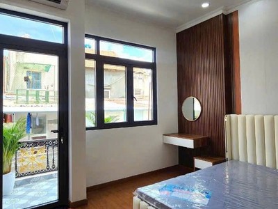 Nhà mới 2 tầng sân thượng nguyễn thị thập  p.bình thuận , q7 4